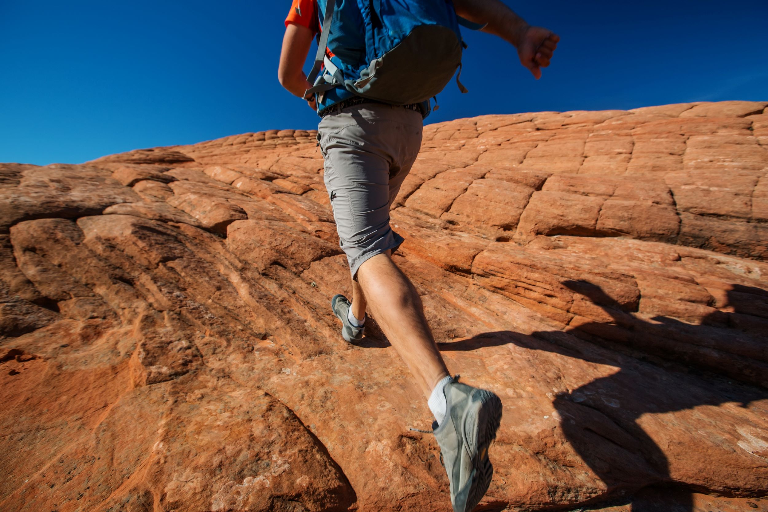 A man hiking in Snow Canyon State Park.